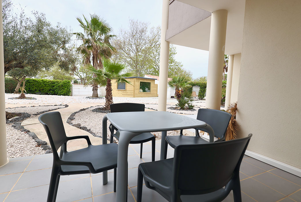 Terrace of an apartment at Jardin de Babylone, naturist property rental in Cap d’Agde
